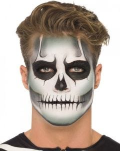a man with a skeleton face make up